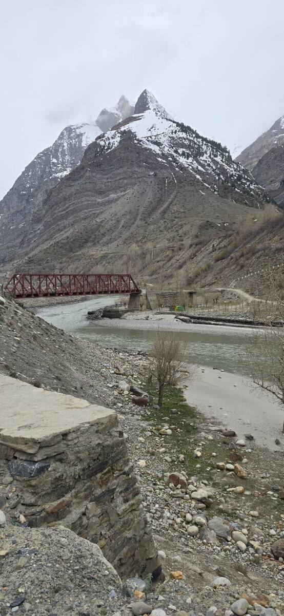 Lahaul valley with snow-fed river and snow-capped peak